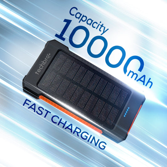 Techbro solar power bank with flashlight on a rocky surface