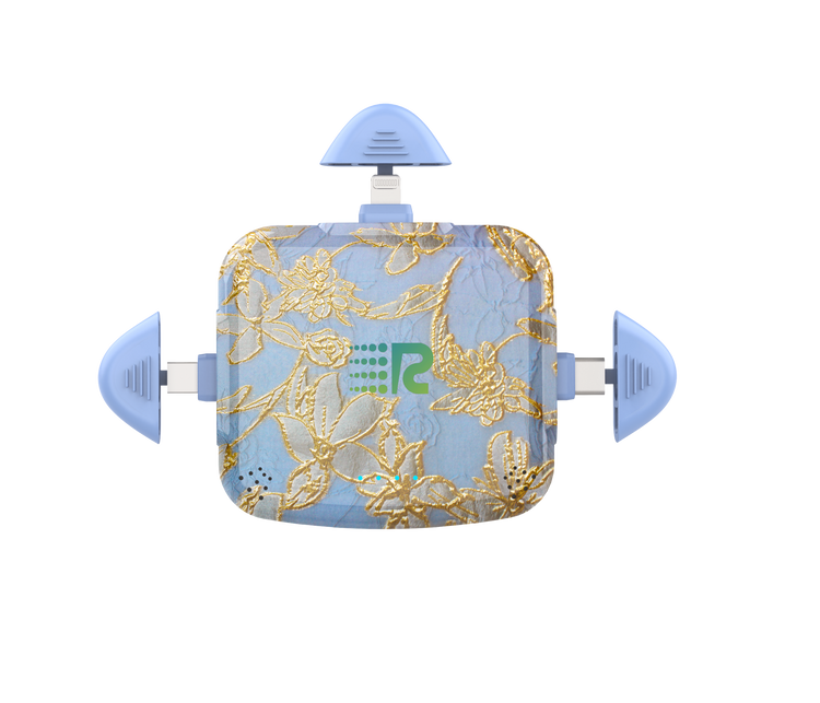 Decorative heating pad with floral pattern and visible brand logo on a white background