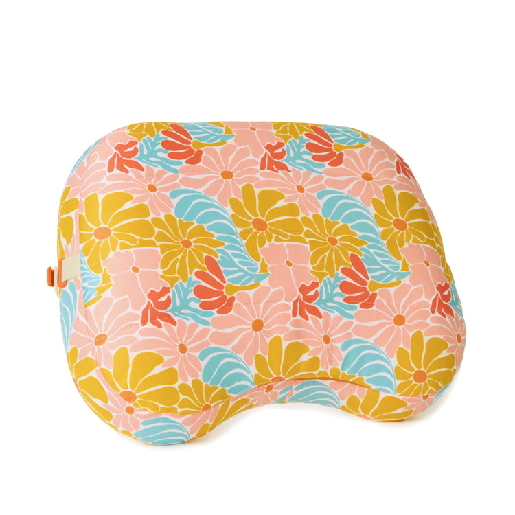 Colorful floral-patterned pillow on a white background