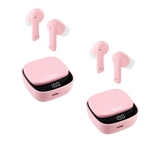 Pink wireless earbuds with charging cases on a white background