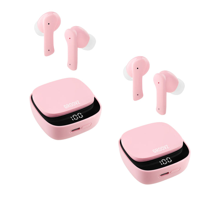 Pink wireless earbuds with charging cases on a white background