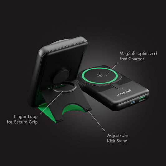 A black NYTSTND Pulse Power Bank with a green accent on the magnetic charging surface, standing upright with an adjustable kickstand.