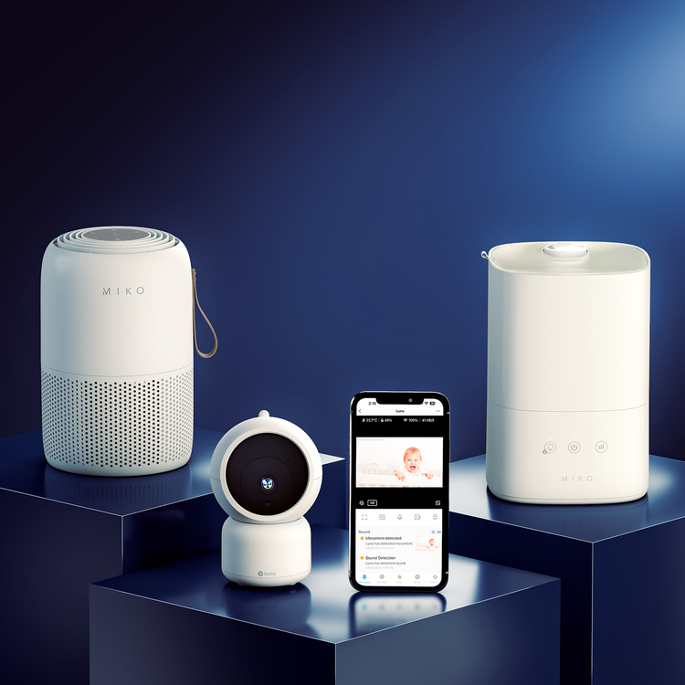 Set of white electronic devices on a blue background with a smartphone displaying an app interface.
