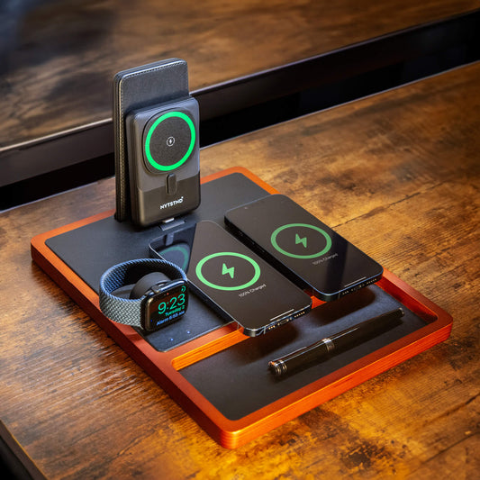 A 4-in-1 MagSafe oak wireless charger with a black and brown color scheme, featuring a section for charging an Apple Watch, a smartphone, and additional wireless charging pads.
