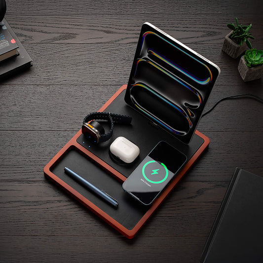 A 4-in-1 MagSafe oak wireless charger with a black and brown color scheme, featuring a section for charging an Apple Watch, a smartphone, and additional wireless charging pads.