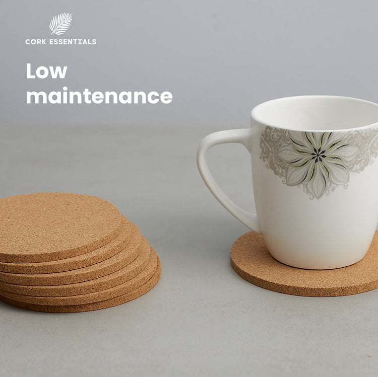 Cork coasters with a mug on a gray background, featuring Cork Essentials branding.