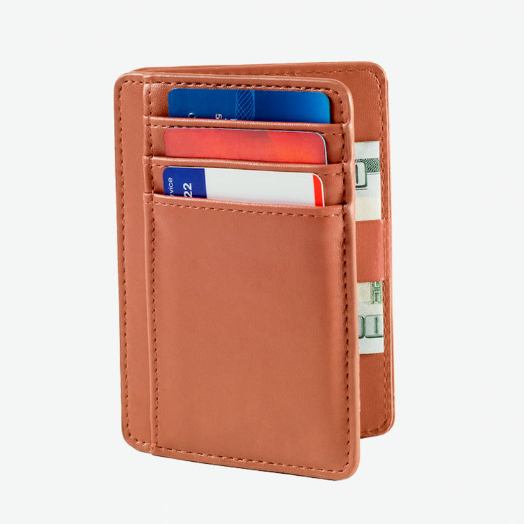 Brown leather wallet with cards and money on a white background