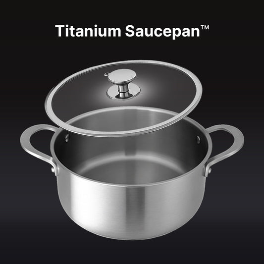 Set of stainless steel cookware including a frying pan, saucepan, and two smaller pots on a white background.