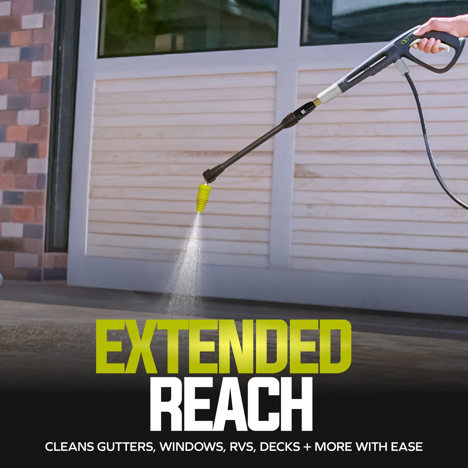 Person using a pressure washer with an extended reach feature to clean a window.