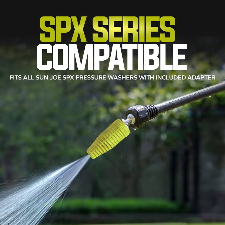 Pressure washer nozzle with water spray and 'SPX Series Compatible' text against a blurred green background.