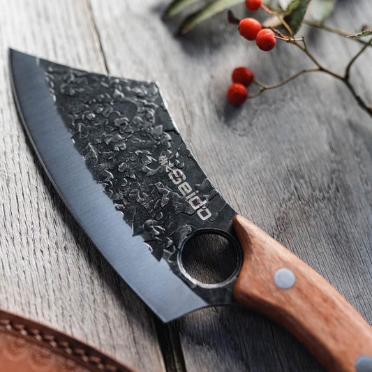 Behold the elegance of the Hakai Cleaver Knife from Seido Knives, with its wooden handle, poised on a cutting board. 