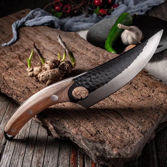 A Kyodai Utility Chef Knife and fresh mushrooms on a cutting board, ready for a delicious culinary adventure!