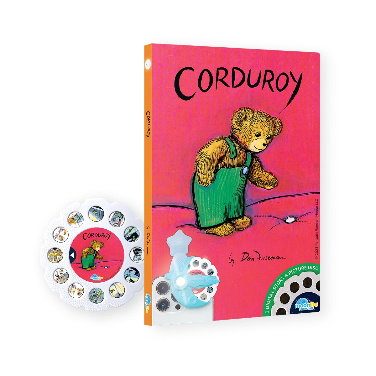 Book titled 'Corduroy' with a teddy bear illustration on a pink background, featuring a spinning wheel and picture disc.
