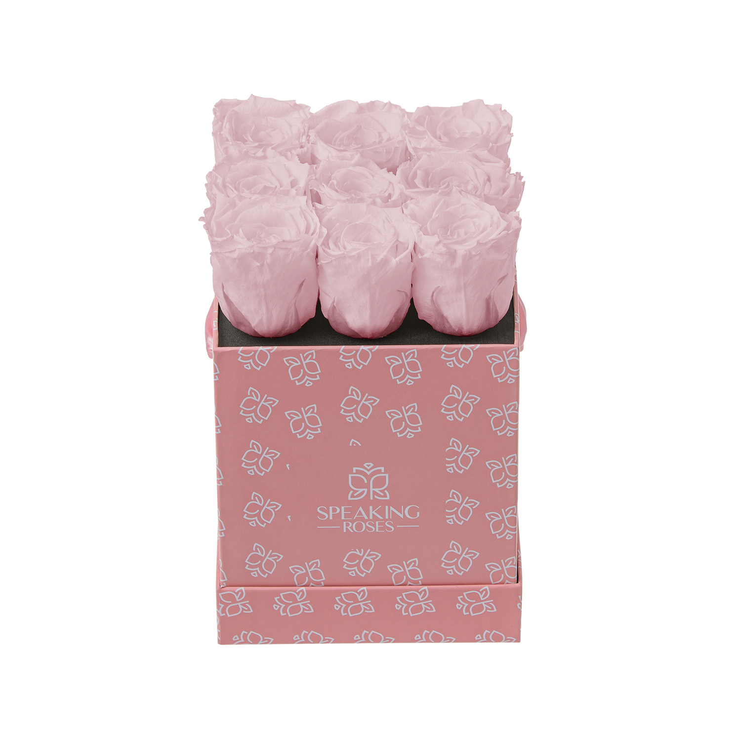 Pink roses in a decorative box with 'Speaking Roses' branding on a white background