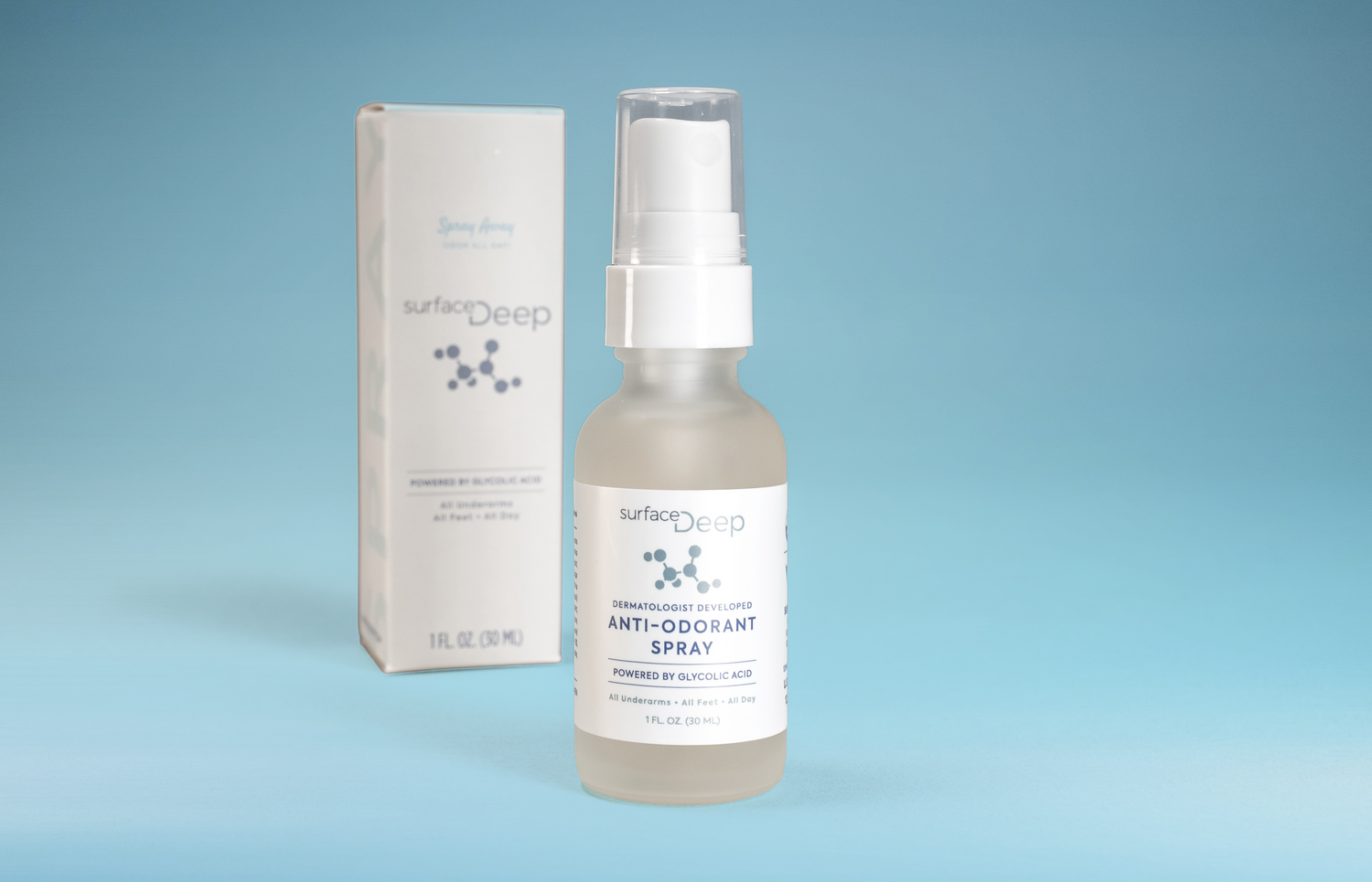 Surface Deep anti-odorant spray bottle and packaging on a blue background
