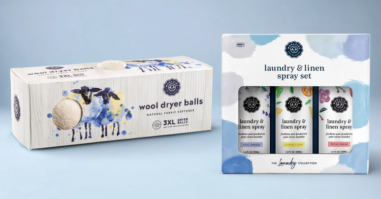 Two packaging boxes for laundry products on a light blue background