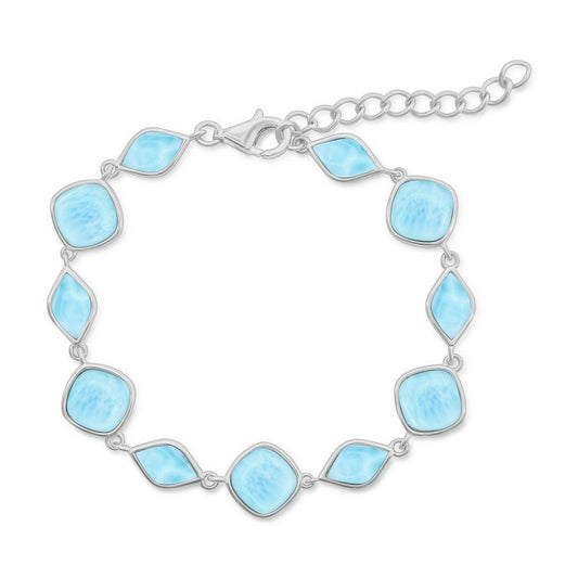 Silver bracelet with light blue gemstones on a white background