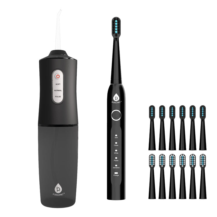 Black electric toothbrush set with multiple brush heads on a white background