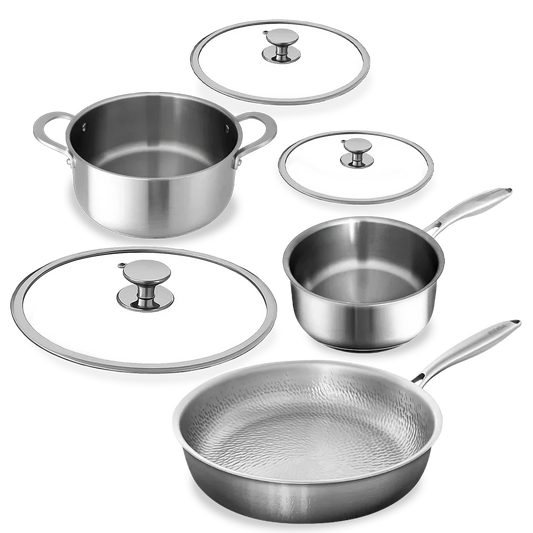 Set of stainless steel cookware including pots, pans, and lids on a white background