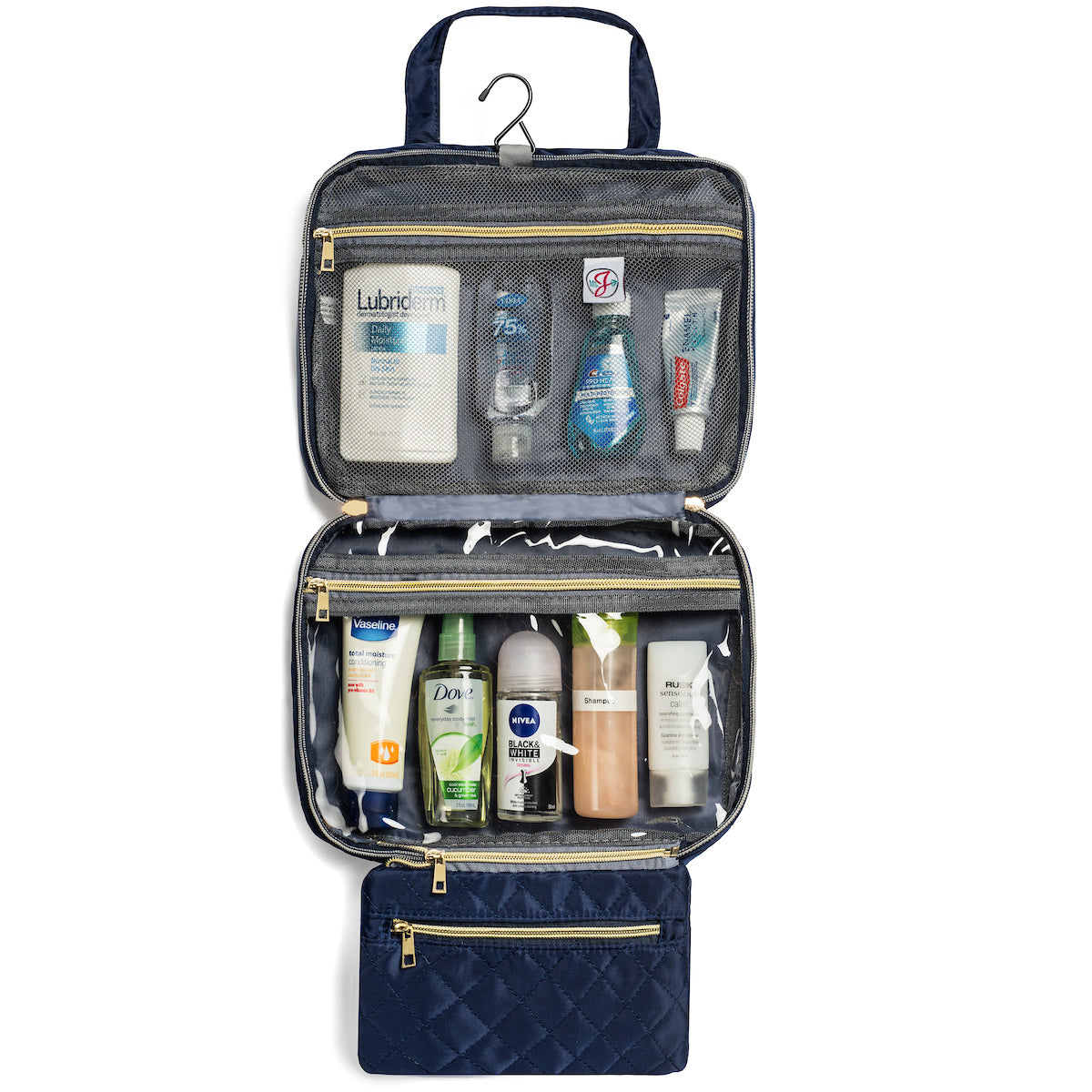 Open navy toiletry bag with various skincare products on a white background