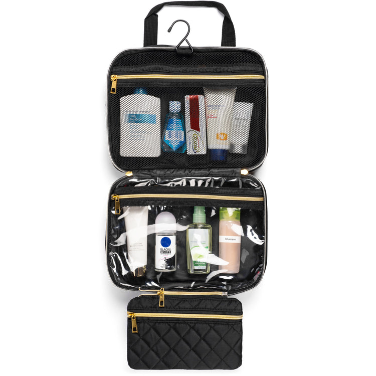Black toiletry bag with various skincare products on a white background