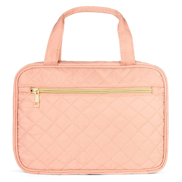 Pink quilted handbag with a gold zipper on a white background