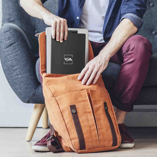 SIDETRAK portable monitor connected to a laptop on a white background