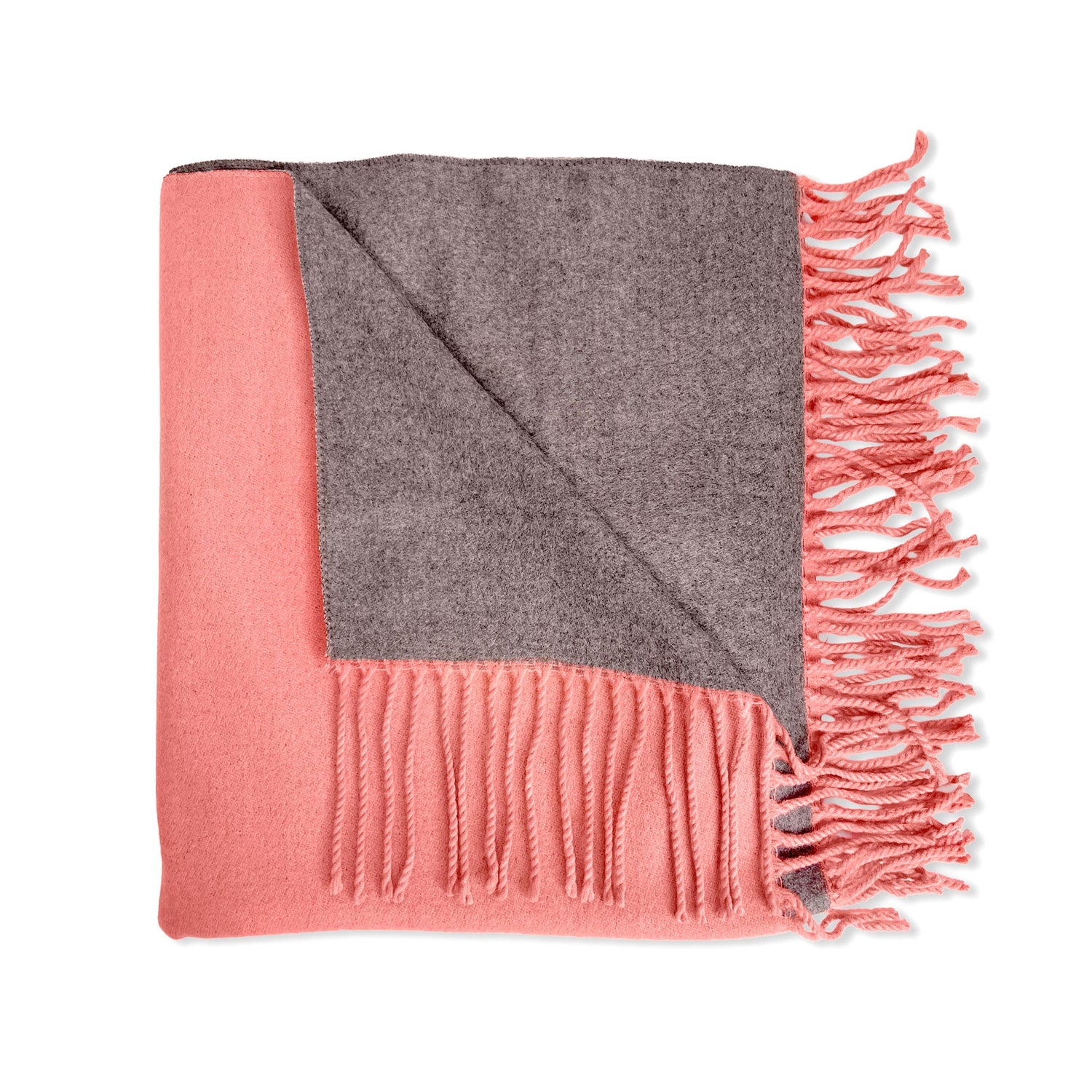 Pink and gray blanket with fringes on a white background