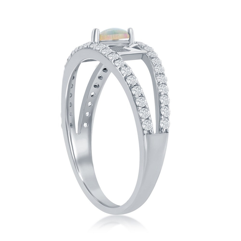 Silver ring with gemstone and diamonds on a white background