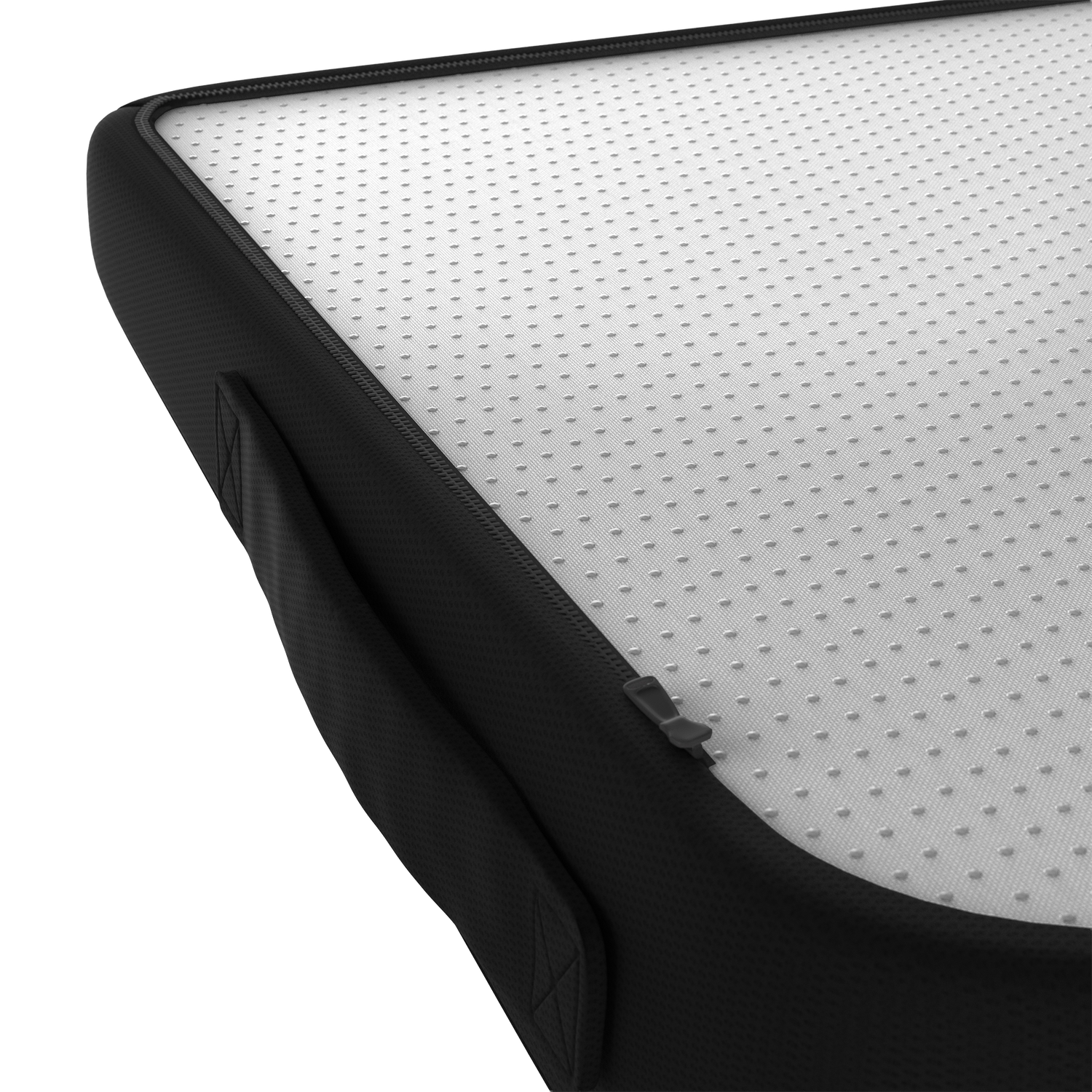 Close-up of a black mattress with a white textured surface on a white background