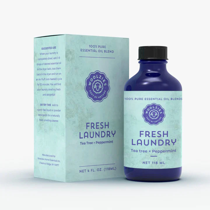Woolzies Fresh Laundry essential oil blend bottle and packaging on a white background