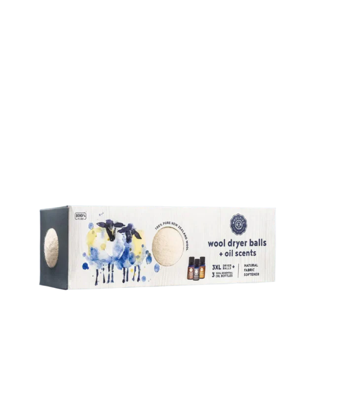 Box of wool dryer balls with oil scents on a white background