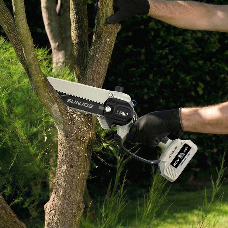 Person using a SUNJOE cordless tree pruner to trim a branch outdoors.