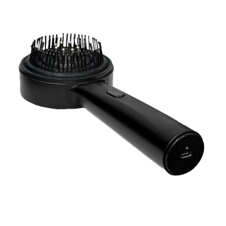 Black hair dryer attachment with bristle brush on a white background