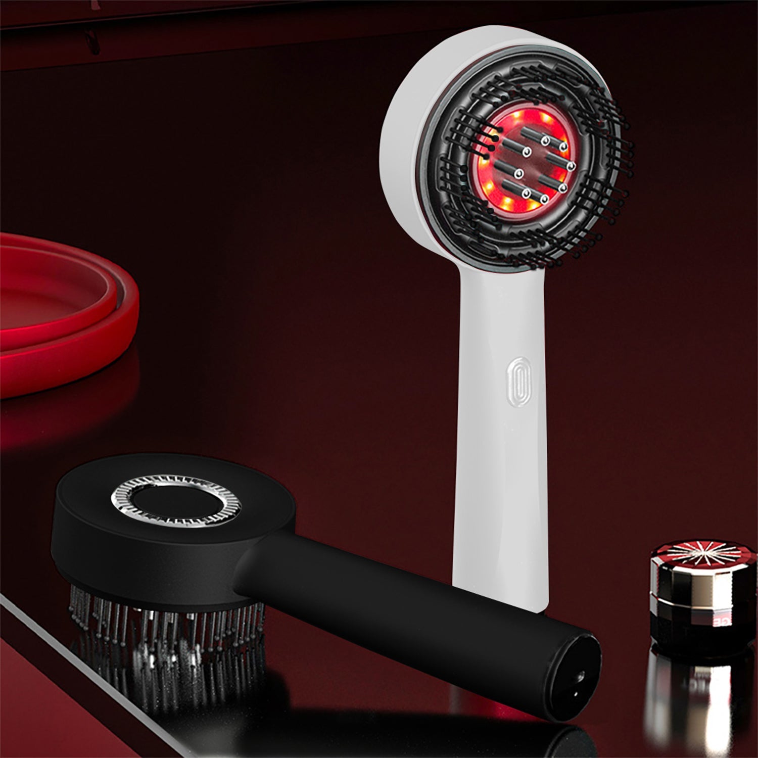 White handheld device with red light and black attachments on a dark surface