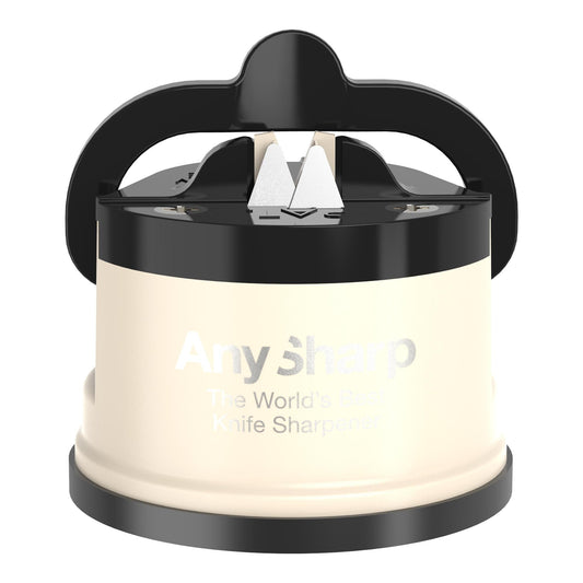 AnySharp Pro Knife Sharpener with a red and black color scheme, attached to a suction cup, being used to sharpen a knife over a kitchen counter.