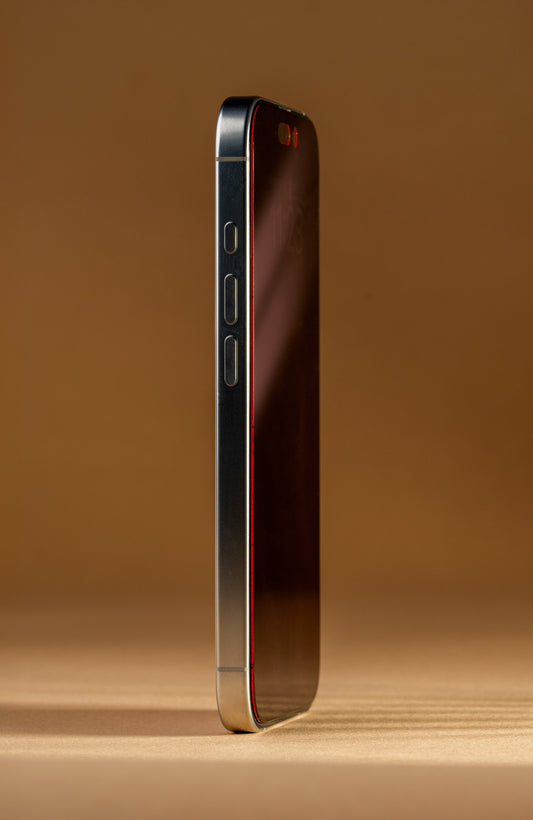 Smartphone with a reflective screen protector on a white background