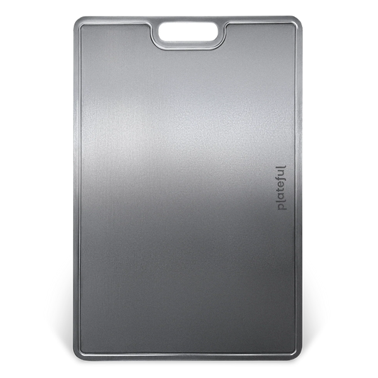 Gray cutting board with a handle on a white background