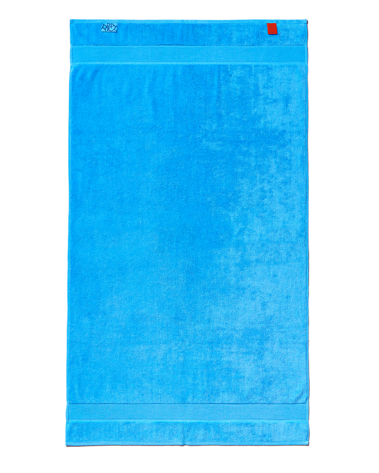 Blue towel with a brand logo on a white background