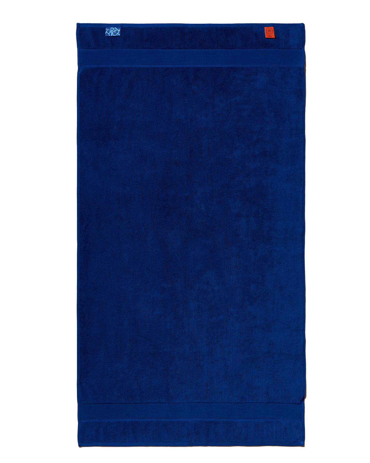 Blue towel with a brand logo on a white background