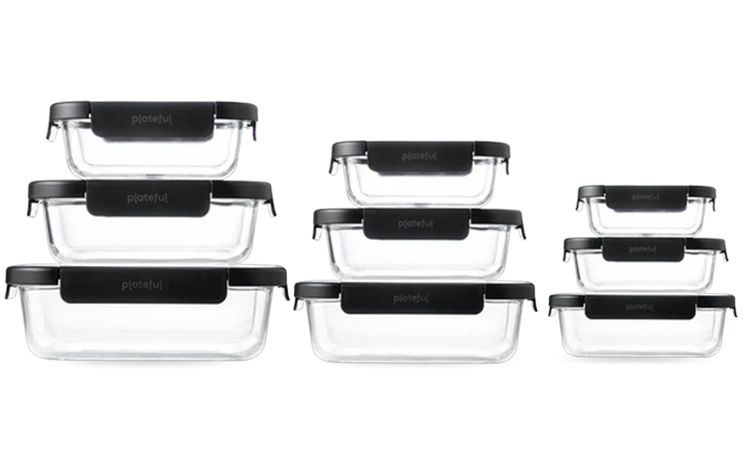Set of glass food storage containers with black lids on a white background
