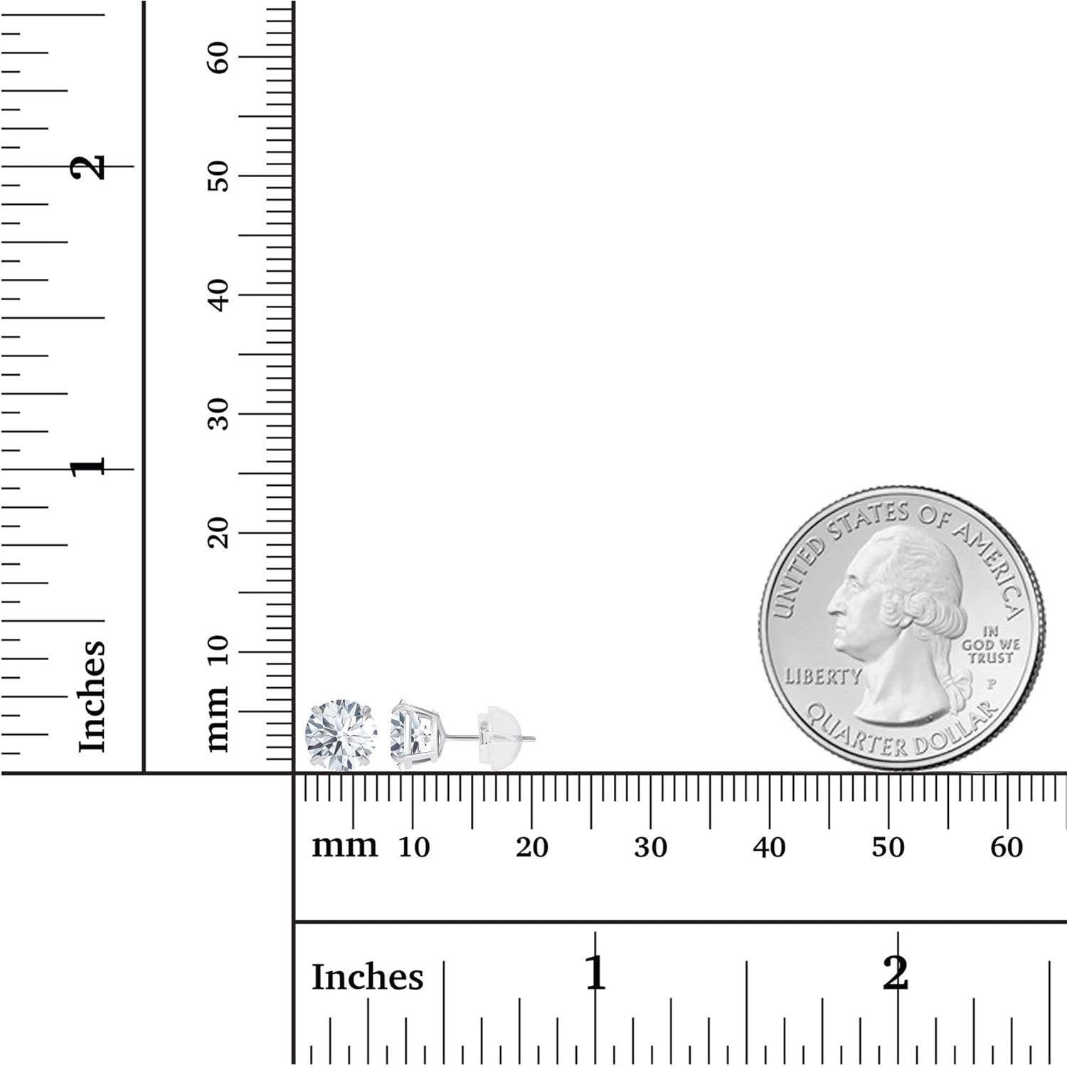 Small silver earrings next to a ruler and a quarter for size reference