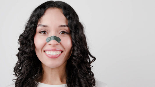 Green package of FLO2 daily nasal strips on a white background