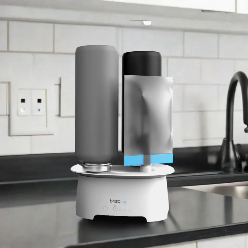 Brisa Powered Drying Rack on a kitchen counter with a blurred background