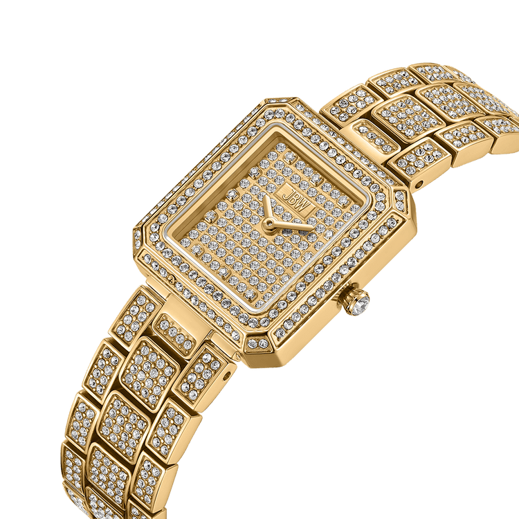 The JBW Watches Arc Double | J6390C features a square gold face and band adorned with sparkling clear crystals. This elegant wristwatch is displayed at an angle against a plain white background.