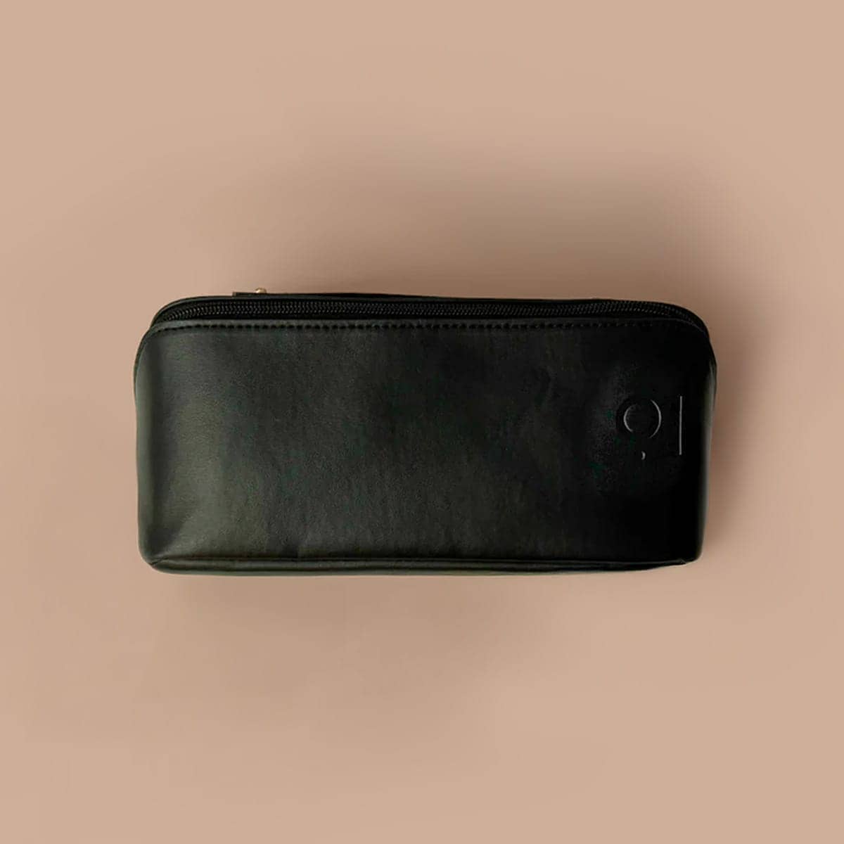 Black leather wallet on a beige background