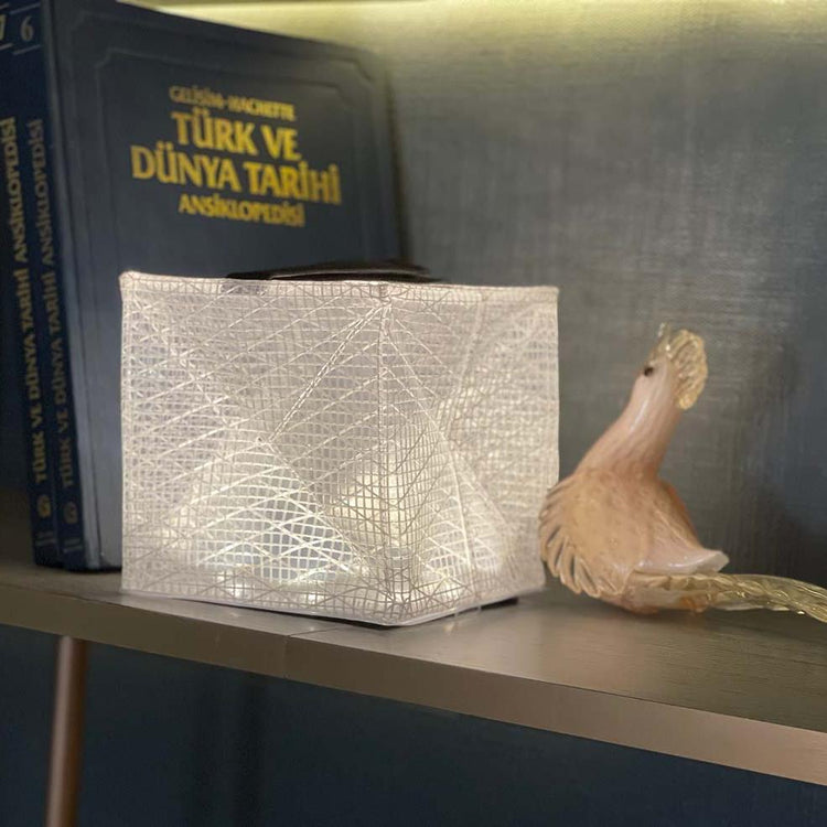 MEGAPUFF displayed on shelf as decorative solar light