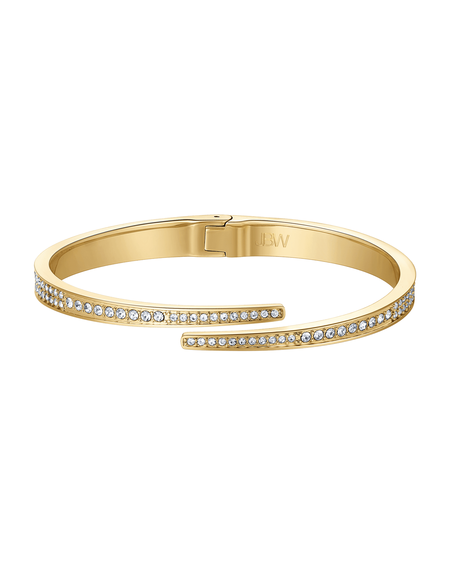 Gold bracelet with diamond accents on a green background