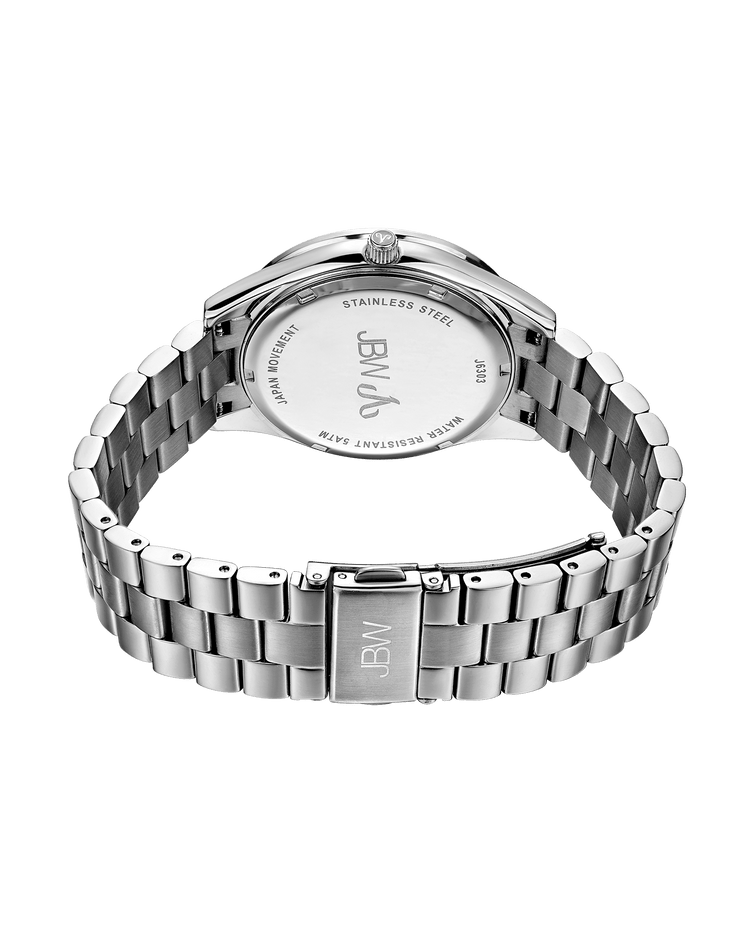 Silver watch with a visible brand logo on a green background