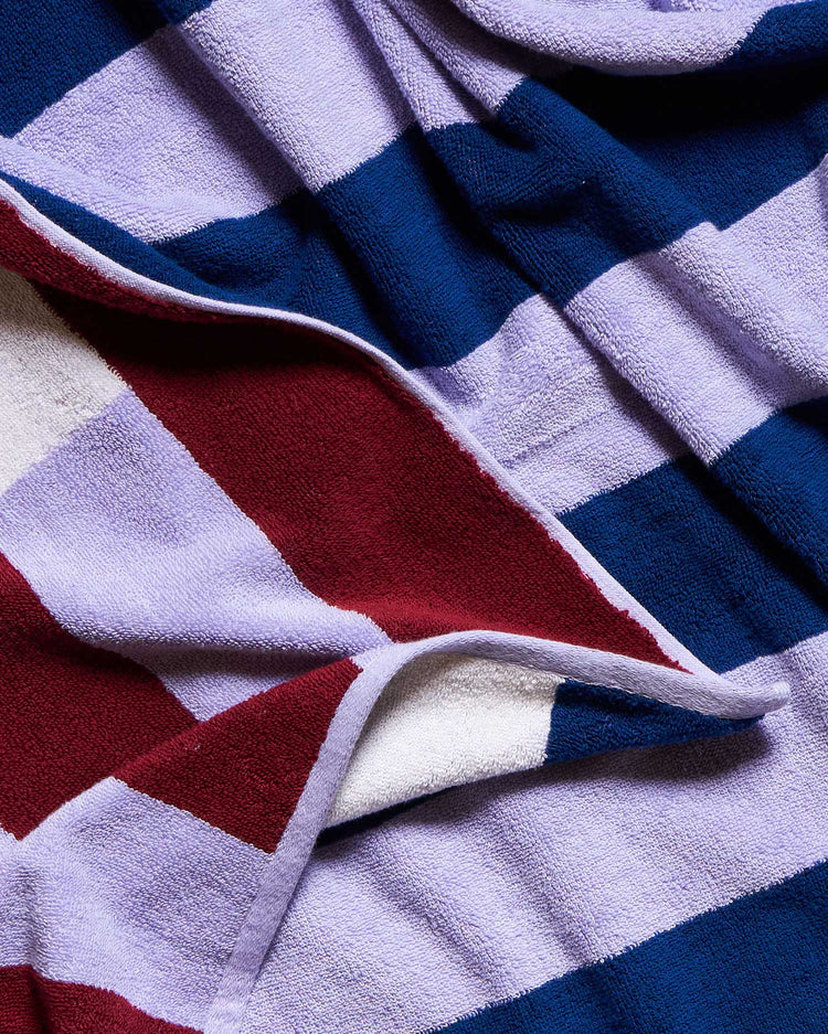 Close-up of a striped towel with red, white, and blue colors.
